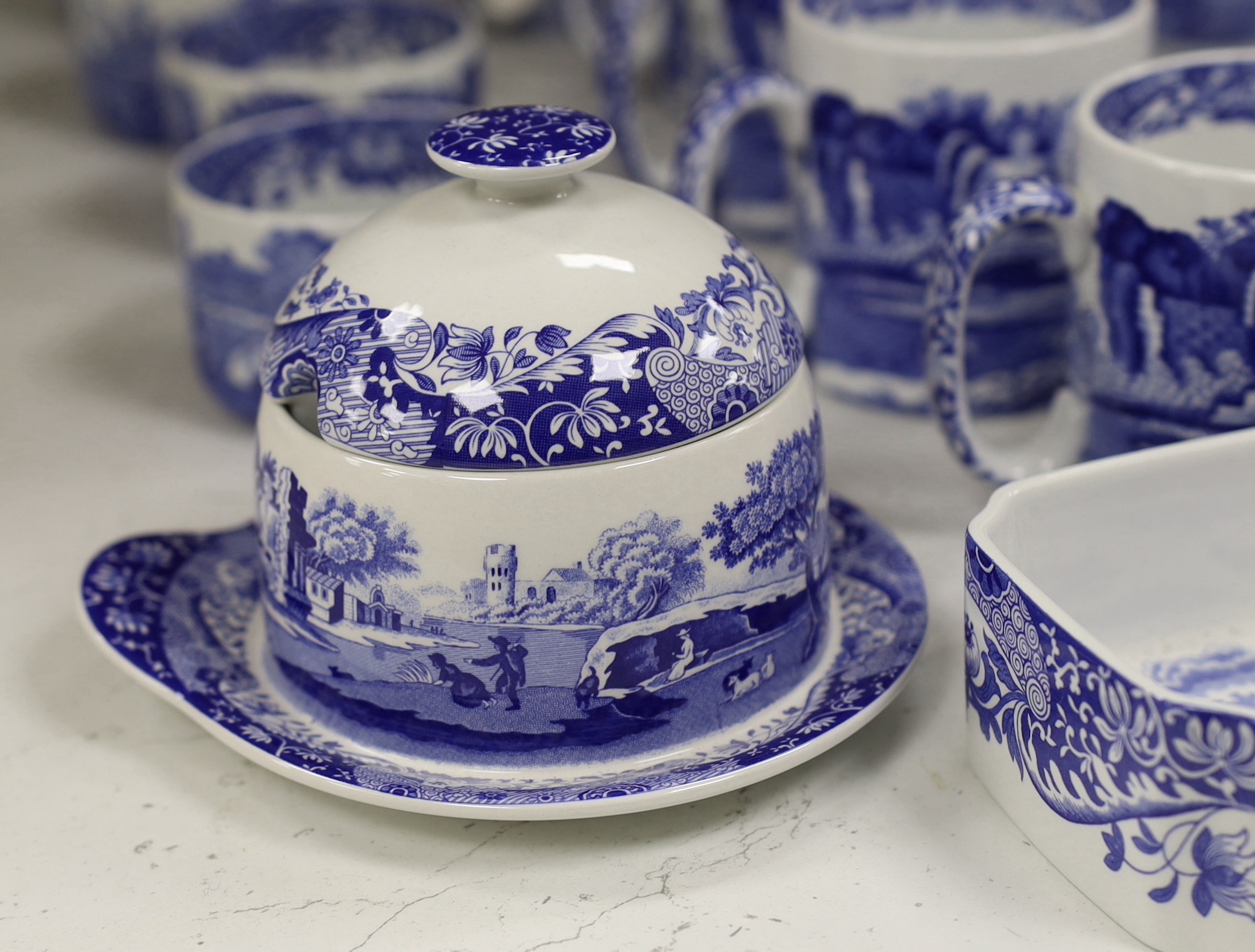 A Spode Italian part breakfast set to include jam and honey pots and covers mugs dishes etc